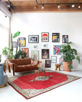 Vintage Turkish rug in a living room setting, pile rug, Turkish rug, vintage rug, portland, rug shop, bright colors, wild shaman, soft rug, bold color, Portland, Oregon, rug store, rug shop, local shop, antique rug