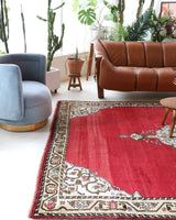 Vintage Turkish rug in a living room setting, pile rug, Turkish rug, vintage rug, portland, rug shop, bright colors, wild shaman, soft rug, bold color, Portland, Oregon, rug store, rug shop, local shop, antique rug