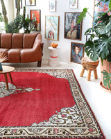 Vintage Turkish rug in a living room setting, pile rug, Turkish rug, vintage rug, portland, rug shop, bright colors, wild shaman, soft rug, bold color, Portland, Oregon, rug store, rug shop, local shop, antique rug