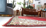 Vintage Turkish rug in a living room setting, pile rug, Turkish rug, vintage rug, portland, rug shop, bright colors, wild shaman, soft rug, bold color, Portland, Oregon, rug store, rug shop, local shop, antique rug
