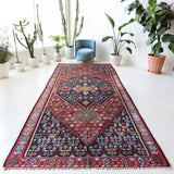 Vintage kilim rug in living room setting, bright colors, wild shaman, soft rug, bold color, Portland, Oregon, rug store, rug shop, local shop, vintage rug, modern kilim, warm colors, antique kilim rug