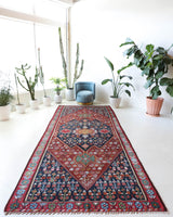 Vintage kilim rug in living room setting, bright colors, wild shaman, soft rug, bold color, Portland, Oregon, rug store, rug shop, local shop, vintage rug, modern kilim, warm colors, antique kilim rug