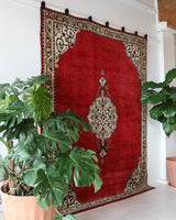 Vintage Turkish rug in a living room setting, pile rug, Turkish rug, vintage rug, portland, rug shop, bright colors, wild shaman, soft rug, bold color, Portland, Oregon, rug store, rug shop, local shop, antique rug