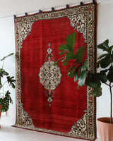 Vintage Turkish rug in a living room setting, pile rug, Turkish rug, vintage rug, portland, rug shop, bright colors, wild shaman, soft rug, bold color, Portland, Oregon, rug store, rug shop, local shop, antique rug