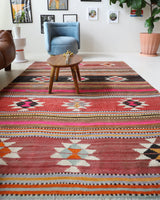 Vintage kilim rug in room decor setting, old rug, antique rug, pastel colors, faded colors, Turkish rug, vintage rug, soft rug, Portland, Oregon, rug store, rug shop, local shop, bold colors, bright colors, faded colors