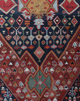 Vintage kilim rug in living room setting, bright colors, wild shaman, soft rug, bold color, Portland, Oregon, rug store, rug shop, local shop, vintage rug, modern kilim, warm colors, antique kilim rug