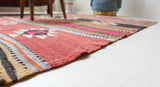 Vintage kilim rug in room decor setting, old rug, antique rug, pastel colors, faded colors, Turkish rug, vintage rug, soft rug, Portland, Oregon, rug store, rug shop, local shop, bold colors, bright colors, faded colors