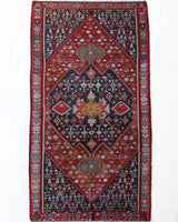 Vintage kilim rug in living room setting, bright colors, wild shaman, soft rug, bold color, Portland, Oregon, rug store, rug shop, local shop, vintage rug, modern kilim, warm colors, antique kilim rug