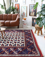 Vintage Turkish rug in a living room setting, pile rug, Turkish rug, vintage rug, portland, rug shop, bright colors, wild shaman, soft rug, bold color, Portland, Oregon, rug store, rug shop, local shop, antique rug