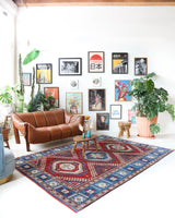Vintage Turkish rug in a living room setting, pile rug, Turkish rug, vintage rug, portland, rug shop, bright colors, wild shaman, soft rug, bold color, Portland, Oregon, rug store, rug shop, local shop, antique rug