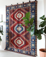 Vintage Turkish rug in a living room setting, pile rug, Turkish rug, vintage rug, portland, rug shop, bright colors, wild shaman, soft rug, bold color, Portland, Oregon, rug store, rug shop, local shop, antique rug