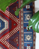 Vintage Turkish rug in a living room setting, pile rug, Turkish rug, vintage rug, portland, rug shop, bright colors, wild shaman, soft rug, bold color, Portland, Oregon, rug store, rug shop, local shop, antique rug