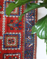 Vintage Turkish rug in a living room setting, pile rug, Turkish rug, vintage rug, portland, rug shop, bright colors, wild shaman, soft rug, bold color, Portland, Oregon, rug store, rug shop, local shop, antique rug