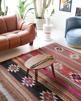 Vintage kilim rug in room decor setting, old rug, antique rug, pastel colors, faded colors, Turkish rug, vintage rug, soft rug, Portland, Oregon, rug store, rug shop, local shop, bold colors, bright colors, faded colors