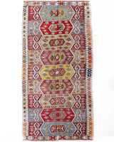 Vintage kilim rug in living room setting, bright colors, wild shaman, soft rug, bold color, Portland, Oregon, rug store, rug shop, local shop, vintage rug, modern kilim, warm colors, antique kilim rug