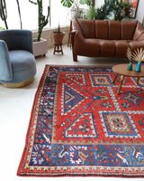 Vintage Turkish rug in a living room setting, pile rug, Turkish rug, vintage rug, portland, rug shop, bright colors, wild shaman, soft rug, bold color, Portland, Oregon, rug store, rug shop, local shop, antique rug