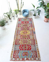 Vintage kilim rug in living room setting, bright colors, wild shaman, soft rug, bold color, Portland, Oregon, rug store, rug shop, local shop, vintage rug, modern kilim, warm colors, antique kilim rug