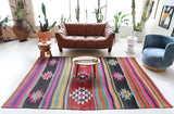 Vintage kilim rug in living room setting, bright colors, wild shaman, soft rug, bold color, Portland, Oregon, rug store, rug shop, local shop, vintage rug, modern kilim, warm colors