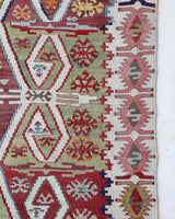 Vintage kilim rug in living room setting, bright colors, wild shaman, soft rug, bold color, Portland, Oregon, rug store, rug shop, local shop, vintage rug, modern kilim, warm colors, antique kilim rug