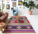 Vintage kilim rug in living room setting, bright colors, wild shaman, soft rug, bold color, Portland, Oregon, rug store, rug shop, local shop, vintage rug, modern kilim, warm colors