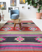 Vintage kilim rug in living room setting, bright colors, wild shaman, soft rug, bold color, Portland, Oregon, rug store, rug shop, local shop, vintage rug, modern kilim, warm colors