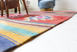 Vintage kilim rug in living room setting, bright colors, wild shaman, soft rug, bold color, Portland, Oregon, rug store, rug shop, local shop, vintage rug, modern kilim, warm colors