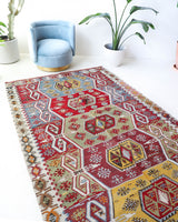 Vintage kilim rug in living room setting, bright colors, wild shaman, soft rug, bold color, Portland, Oregon, rug store, rug shop, local shop, vintage rug, modern kilim, warm colors, antique kilim rug