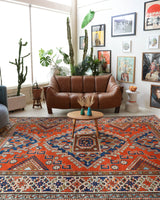 Vintage Turkish rug in a living room setting, pile rug, Turkish rug, vintage rug, portland, rug shop, bright colors, wild shaman, soft rug, bold color, Portland, Oregon, rug store, rug shop, local shop, antique rug