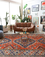 Vintage Turkish rug in a living room setting, pile rug, Turkish rug, vintage rug, portland, rug shop, bright colors, wild shaman, soft rug, bold color, Portland, Oregon, rug store, rug shop, local shop, antique rug