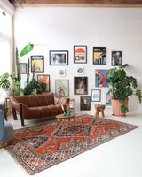 Vintage Turkish rug in a living room setting, pile rug, Turkish rug, vintage rug, portland, rug shop, bright colors, wild shaman, soft rug, bold color, Portland, Oregon, rug store, rug shop, local shop, antique rug