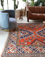 Vintage Turkish rug in a living room setting, pile rug, Turkish rug, vintage rug, portland, rug shop, bright colors, wild shaman, soft rug, bold color, Portland, Oregon, rug store, rug shop, local shop, antique rug