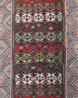 Vintage kilim rug in living room setting, bright colors, wild shaman, soft rug, bold color, Portland, Oregon, rug store, rug shop, local shop, vintage rug, modern kilim, warm colors, antique kilim rug