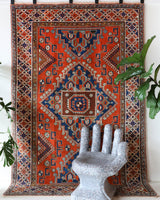 Vintage Turkish rug in a living room setting, pile rug, Turkish rug, vintage rug, portland, rug shop, bright colors, wild shaman, soft rug, bold color, Portland, Oregon, rug store, rug shop, local shop, antique rug