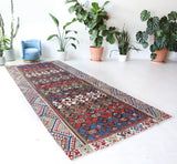 Vintage kilim rug in living room setting, bright colors, wild shaman, soft rug, bold color, Portland, Oregon, rug store, rug shop, local shop, vintage rug, modern kilim, warm colors, antique kilim rug