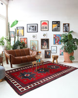 Vintage Turkish rug in a living room setting, pile rug, Turkish rug, vintage rug, portland, rug shop, bright colors, wild shaman, soft rug, bold color, Portland, Oregon, rug store, rug shop, local shop, antique rug