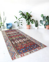 Vintage kilim rug in living room setting, bright colors, wild shaman, soft rug, bold color, Portland, Oregon, rug store, rug shop, local shop, vintage rug, modern kilim, warm colors, antique kilim rug