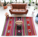 Vintage kilim rug in living room setting, bright colors, wild shaman, soft rug, bold color, Portland, Oregon, rug store, rug shop, local shop, vintage rug, modern kilim, warm colors