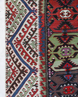 Vintage kilim rug in living room setting, bright colors, wild shaman, soft rug, bold color, Portland, Oregon, rug store, rug shop, local shop, vintage rug, modern kilim, warm colors, antique kilim rug