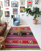 Vintage kilim rug in living room setting, bright colors, wild shaman, soft rug, bold color, Portland, Oregon, rug store, rug shop, local shop, vintage rug, modern kilim, warm colors