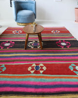 Vintage kilim rug in living room setting, bright colors, wild shaman, soft rug, bold color, Portland, Oregon, rug store, rug shop, local shop, vintage rug, modern kilim, warm colors