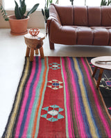Vintage kilim rug in living room setting, bright colors, wild shaman, soft rug, bold color, Portland, Oregon, rug store, rug shop, local shop, vintage rug, modern kilim, warm colors