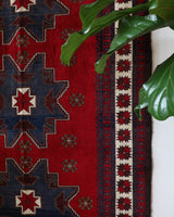 Vintage Turkish rug in a living room setting, pile rug, Turkish rug, vintage rug, portland, rug shop, bright colors, wild shaman, soft rug, bold color, Portland, Oregon, rug store, rug shop, local shop, antique rug