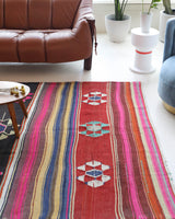 Vintage kilim rug in living room setting, bright colors, wild shaman, soft rug, bold color, Portland, Oregon, rug store, rug shop, local shop, vintage rug, modern kilim, warm colors