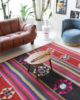 Vintage kilim rug in living room setting, bright colors, wild shaman, soft rug, bold color, Portland, Oregon, rug store, rug shop, local shop, vintage rug, modern kilim, warm colors