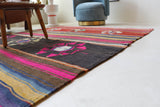Vintage kilim rug in living room setting, bright colors, wild shaman, soft rug, bold color, Portland, Oregon, rug store, rug shop, local shop, vintage rug, modern kilim, warm colors