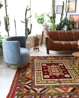 Vintage Turkish rug in a living room setting, pile rug, Turkish rug, vintage rug, portland, rug shop, bright colors, wild shaman, soft rug, bold color, Portland, Oregon, rug store, rug shop, local shop, antique rug