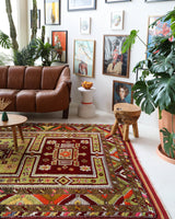 Vintage Turkish rug in a living room setting, pile rug, Turkish rug, vintage rug, portland, rug shop, bright colors, wild shaman, soft rug, bold color, Portland, Oregon, rug store, rug shop, local shop, antique rug