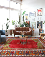 Vintage Turkish rug in a living room setting, pile rug, Turkish rug, vintage rug, portland, rug shop, bright colors, wild shaman, soft rug, bold color, Portland, Oregon, rug store, rug shop, local shop, antique rug