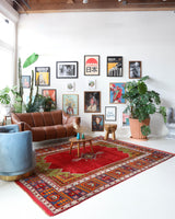 Vintage Turkish rug in a living room setting, pile rug, Turkish rug, vintage rug, portland, rug shop, bright colors, wild shaman, soft rug, bold color, Portland, Oregon, rug store, rug shop, local shop, antique rug