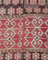 Vintage kilim rug in living room setting, old rug, antique rug, pastel colors, faded colors, Turkish rug, vintage rug, soft rug, Portland, Oregon, rug store, rug shop, local shop, earthy tones, earthy colors, warm colors